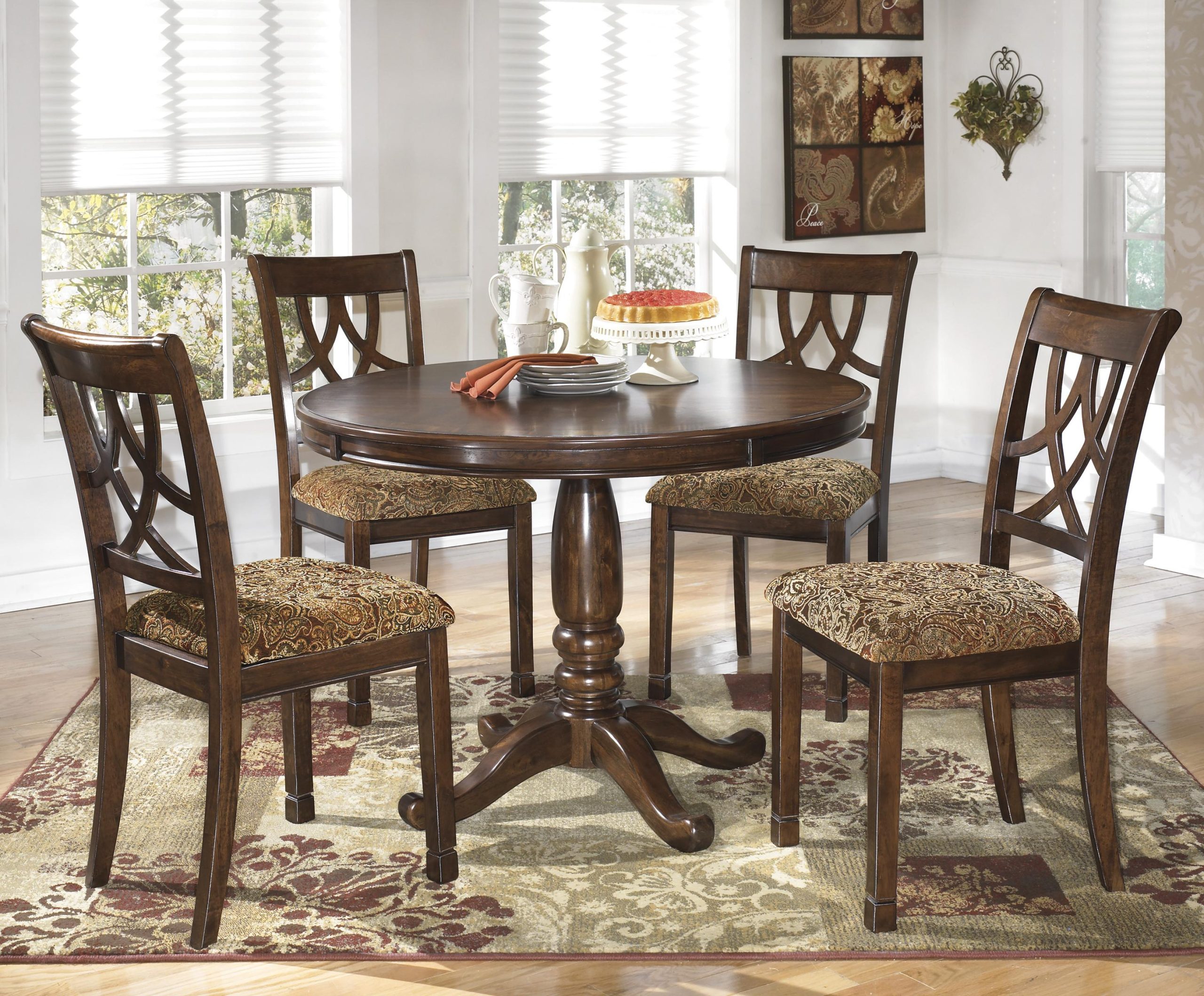 Signature Design By Ashley Leahlyn 5-Piece Cherry Finish Round Dining ... intended for Creating a Welcoming Dining Space: Design Ideas for Every Home