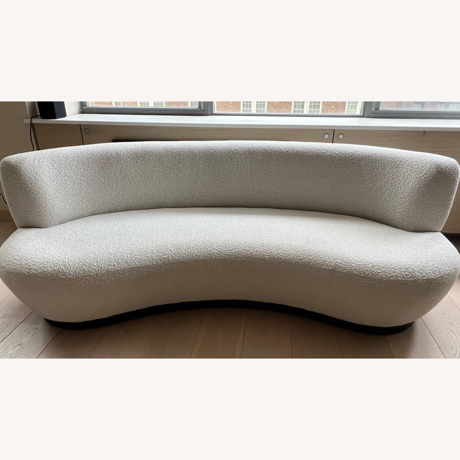 Safavieh Boucle Curved Ivory Sofa - Aptdeco inside Styling Your Space with the Luxurious Safavieh Dyanna Boucle Sofa