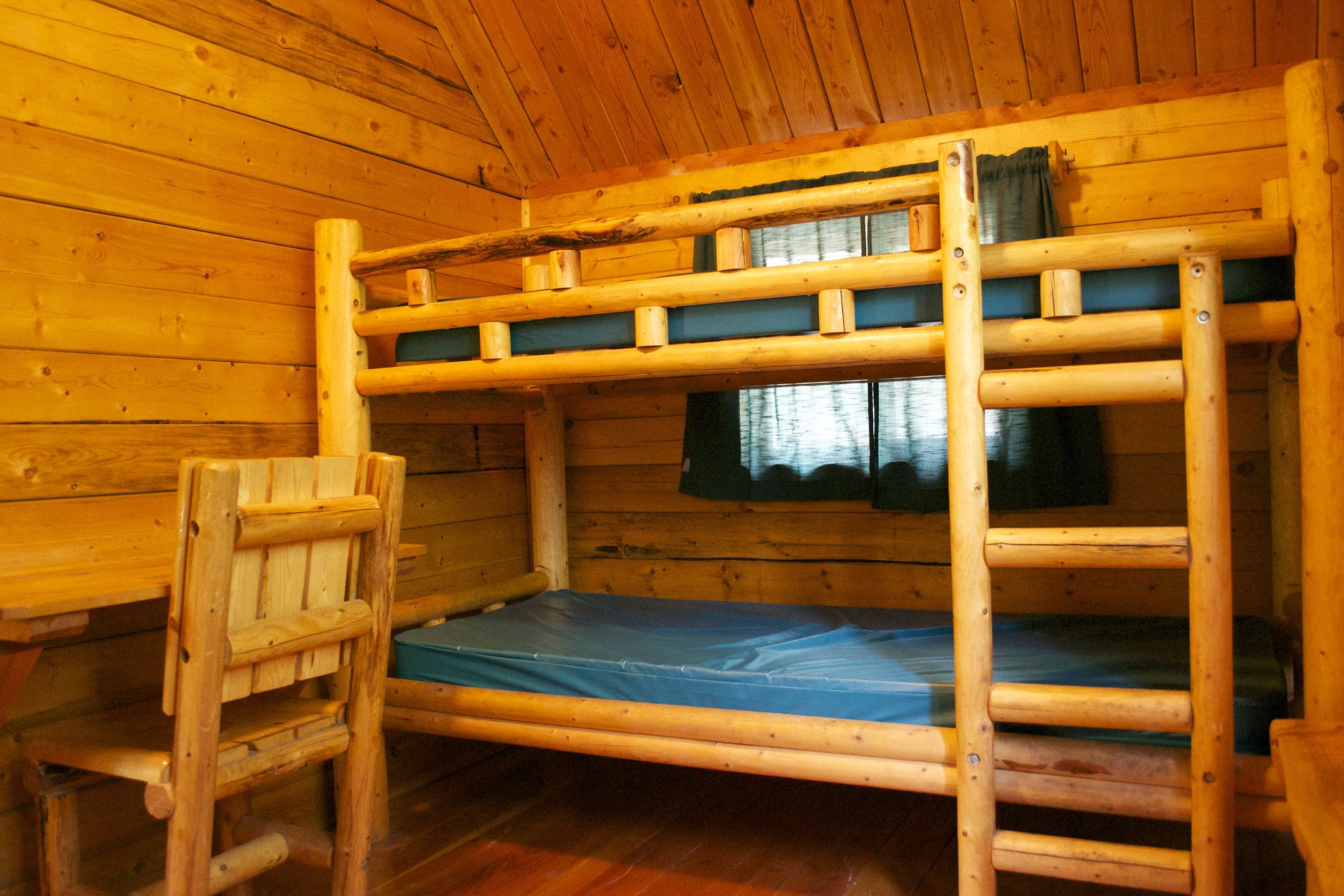 Bunk Beds Inside Our Two Room Camping Cabin. throughout From Bunk Beds to Best Friends How Camp Beds Foster Connection