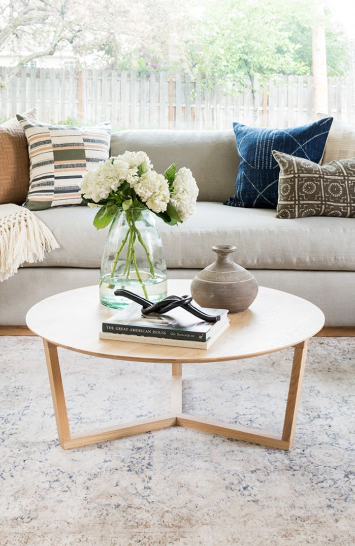 Great Tips For Styling A Round Coffee Table From Interior Design Firm ... intended for How to Style Your Space with the Valerie Round Marble Accent Table