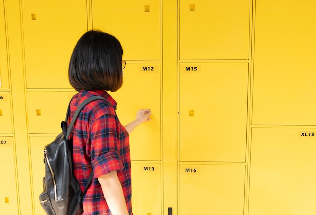 Premium Photo | Selfservice Storage Locker Tourist Uses The Service Of ... within
