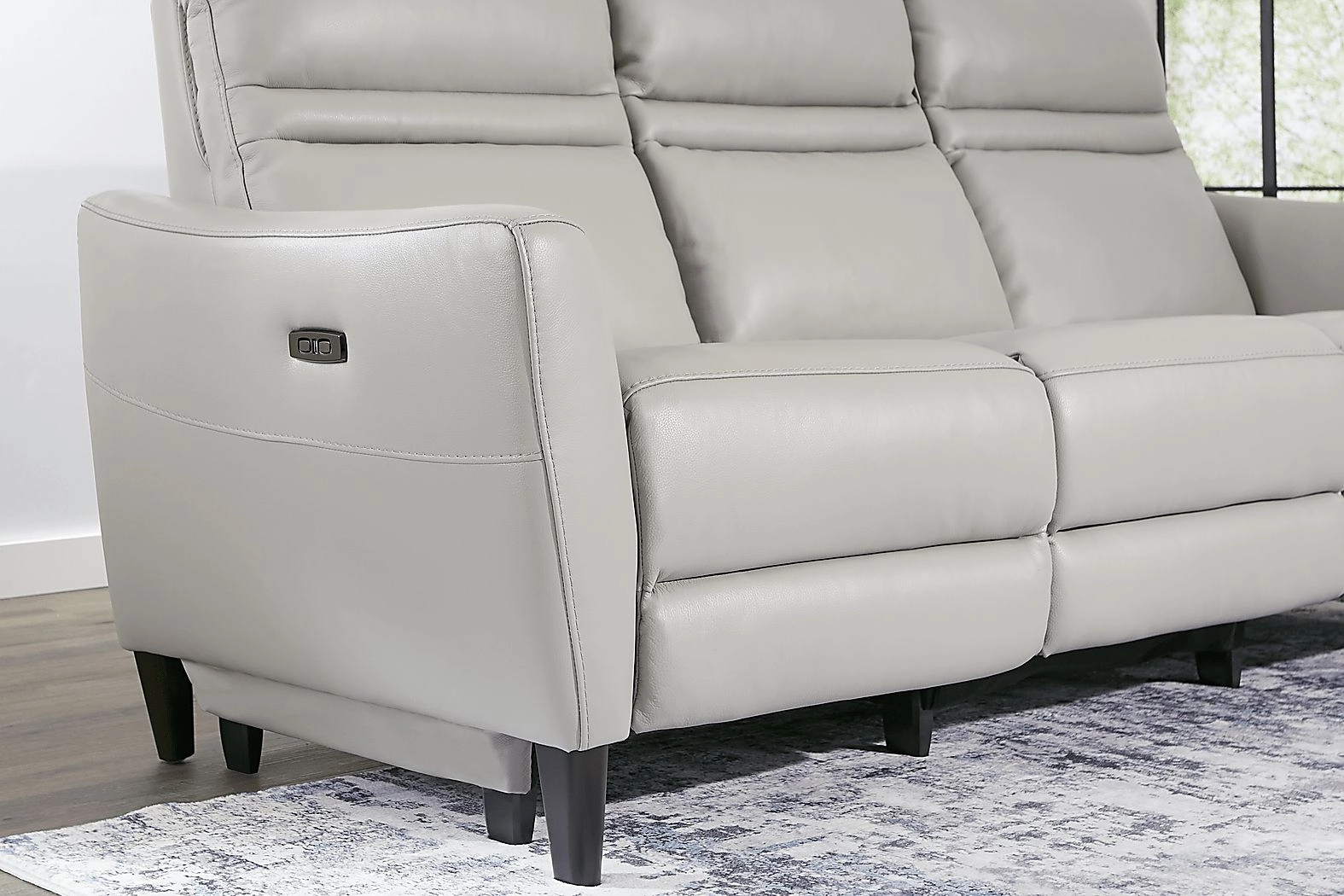 Larino Light Gray Leather Dual Power Reclining Sofa intended for Why a Dual Power Reclining Design Elevates Your Living Space