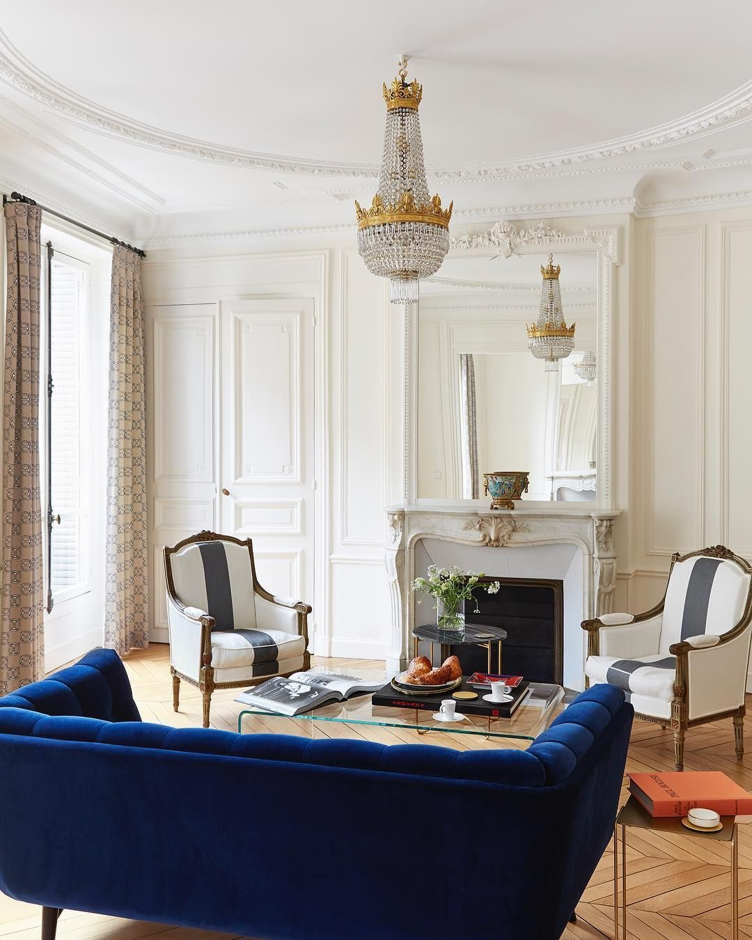 59 Parisian Living Rooms To Make You Swoon in Paris Sofa Blue
