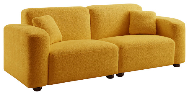 Interior design trends featuring neutral-toned boucle upholstery materials