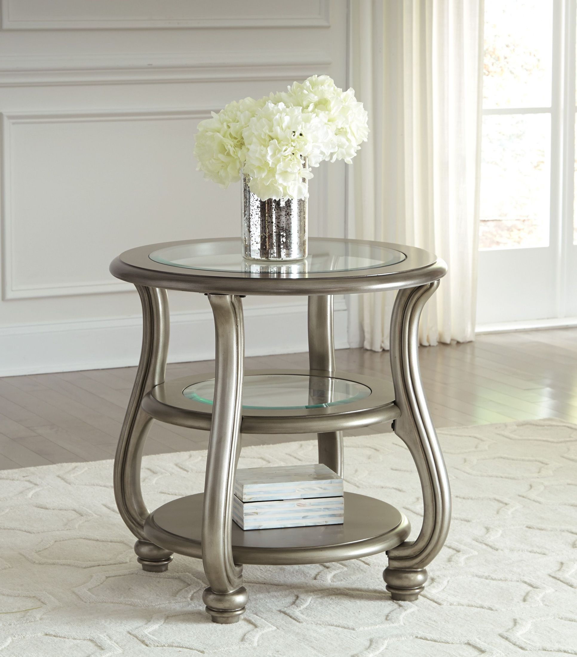 Coralayne Silver Round End Table From Ashley (T820-6) | Coleman Furniture for Mahdavi Round Metal Accent Table, Silver, 25.5X25.5X15.5
