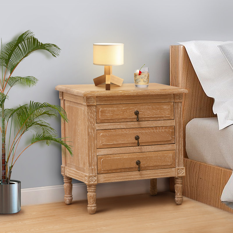 One Allium Way® Rosemarie 3 - Drawer Solid Wood Nightstand In Oak | Wayfair throughout 34" Champagne Novelty Three Drawers Solid Wood Nightstand