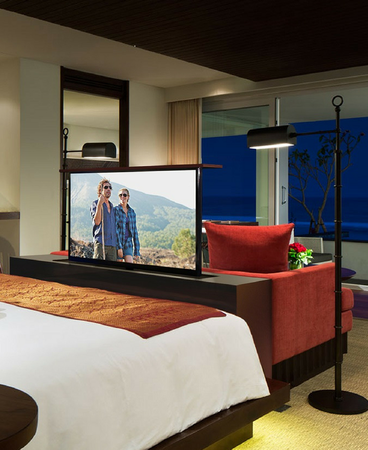 A Beautiful Bedroom With A Pop-Up Tv In The Cabinet At The End Of The ... regarding Bedroom Innovation Trends Featuring Pop Up Television Technology