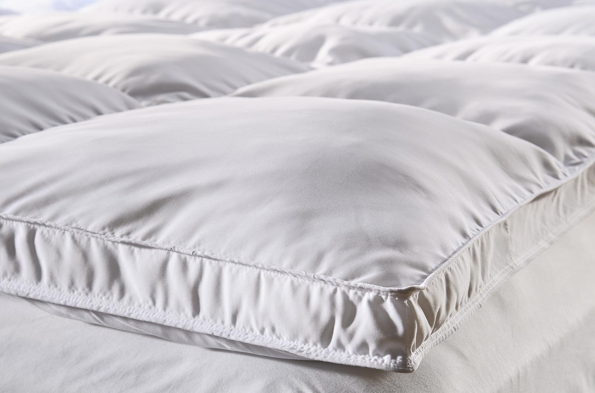 Feather & Down Mattress Topper (Hypoallergenic) Double : Amazon.co.uk ... inside How down feather bedding can transform your sleep quality and comfort