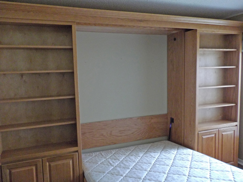 Library Bookcase: Sliding / Pivoting Murphy Bed | Tampa Bay within Maximizing Small Spaces with Murphy Bed and Sliding Bookshelf Integration