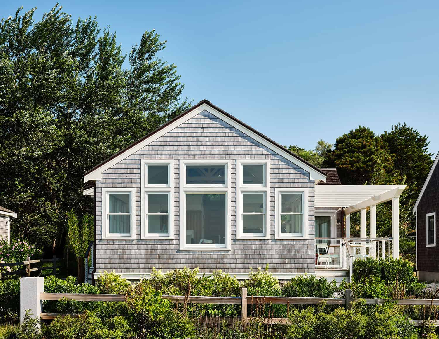 Cape Cod Beach House Gets Updated With Clever Small Space Design Ideas with 1 1 2 Story House